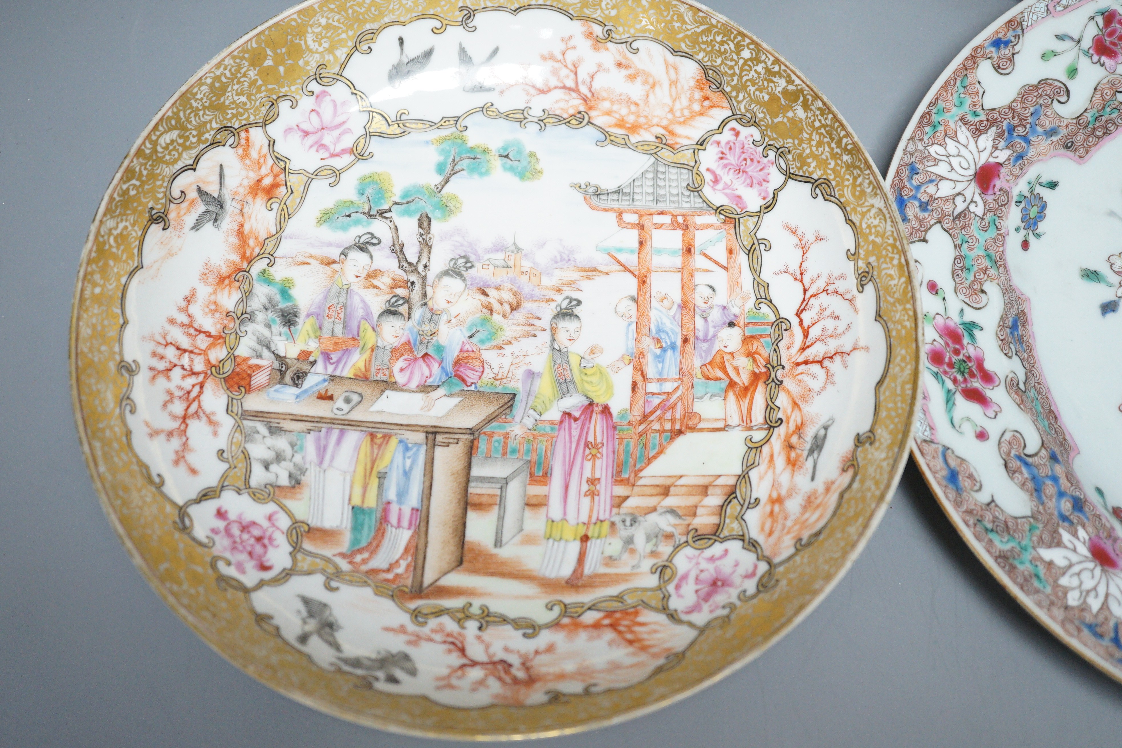 A pair of 18th century Chinese export famille rose plates and two others, largest 23cm